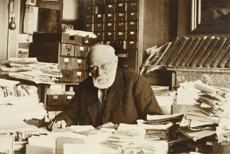 Otlet to work in an office built at his home following the closure of the Palais Mondial in June 1937